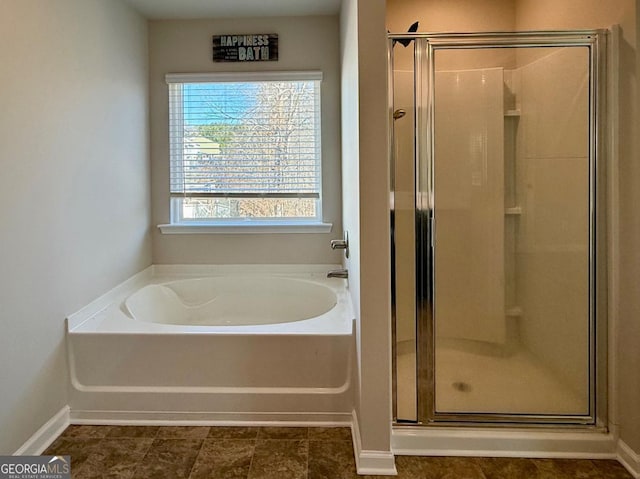 bathroom featuring plus walk in shower