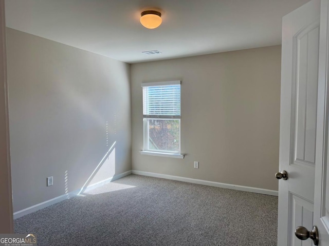 view of carpeted spare room