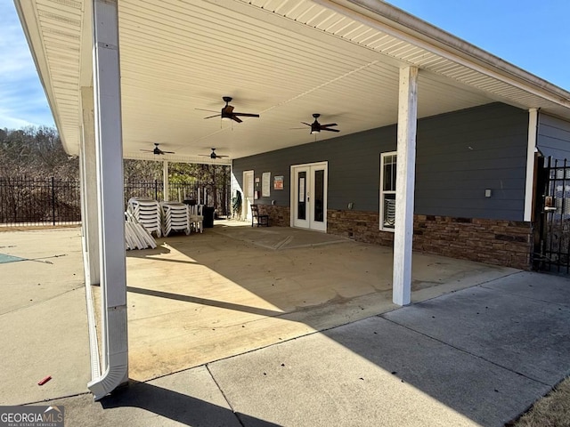 view of patio / terrace with ceiling fan and french doors