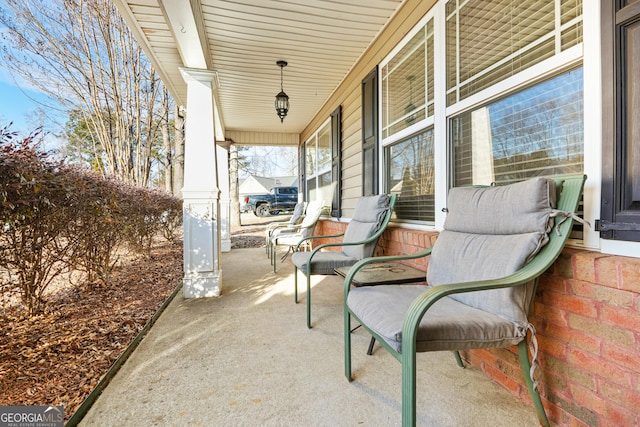 view of patio featuring a porch