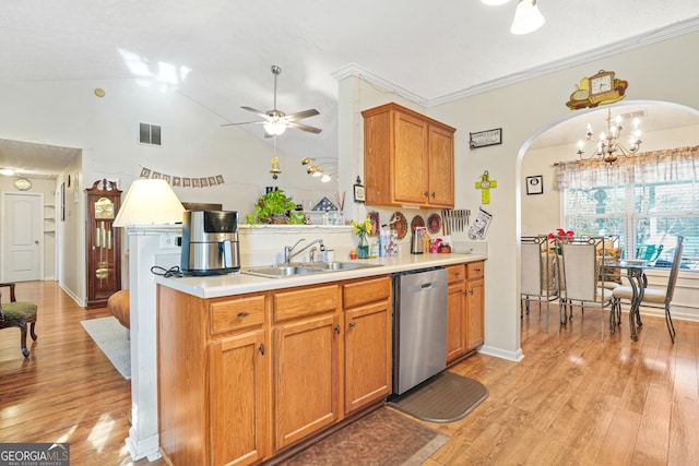 kitchen with sink, crown molding, decorative light fixtures, stainless steel dishwasher, and light wood-type flooring