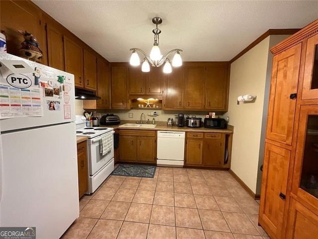 kitchen featuring sink, a chandelier, pendant lighting, white appliances, and light tile patterned floors