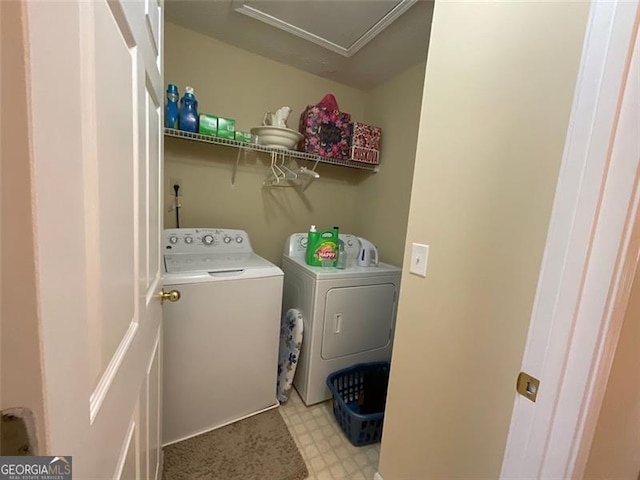 washroom featuring independent washer and dryer