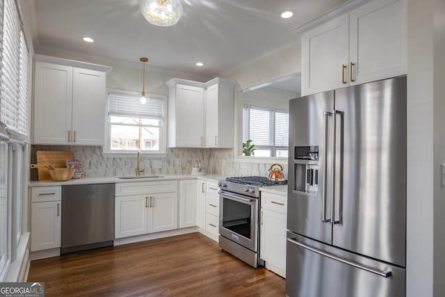 kitchen featuring white cabinetry and premium appliances