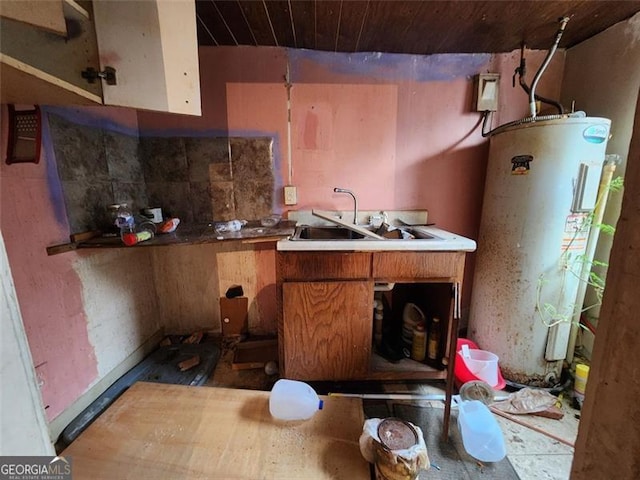 kitchen with electric water heater and sink