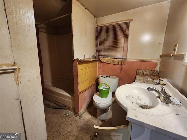 bathroom featuring walk in shower, vanity, and toilet