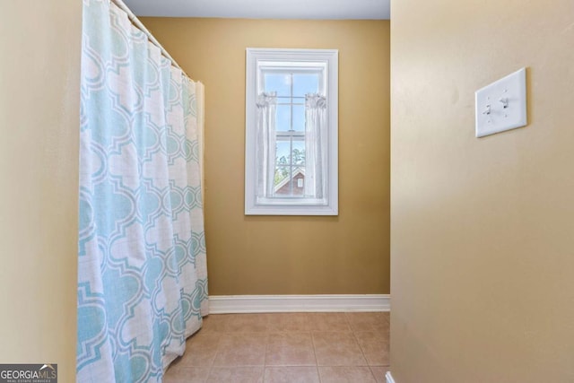 bathroom featuring tile patterned flooring