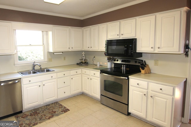 kitchen with sink, white cabinets, appliances with stainless steel finishes, light tile patterned flooring, and ornamental molding