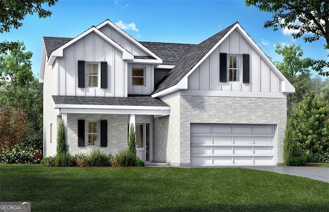 view of front of home featuring a front yard and a garage