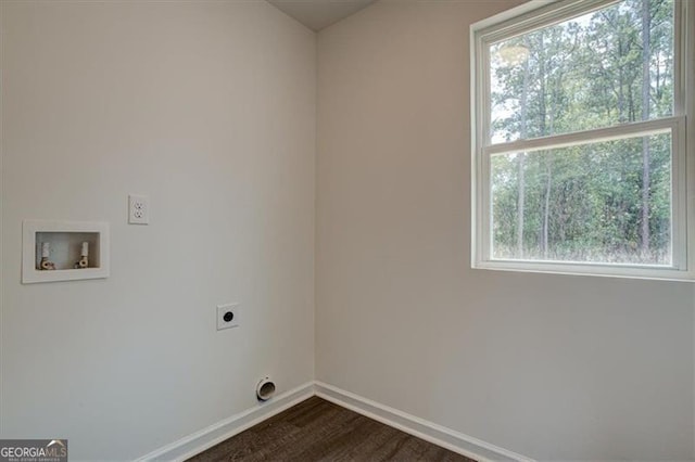 laundry room featuring electric dryer hookup, hookup for a washing machine, and plenty of natural light