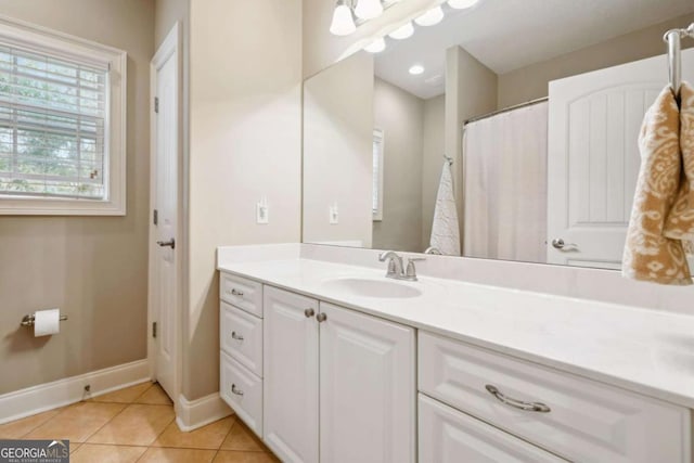 bathroom featuring tile patterned floors and vanity