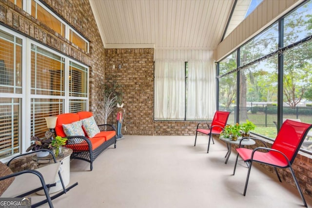 sunroom with vaulted ceiling