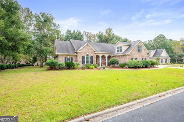 view of front of property with a front lawn