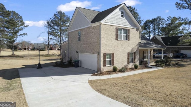 view of side of property with a garage