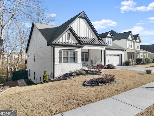 modern farmhouse style home with a garage