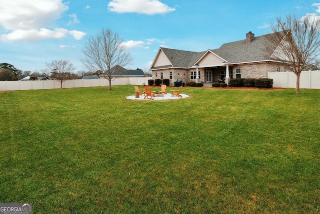 exterior space with a fire pit