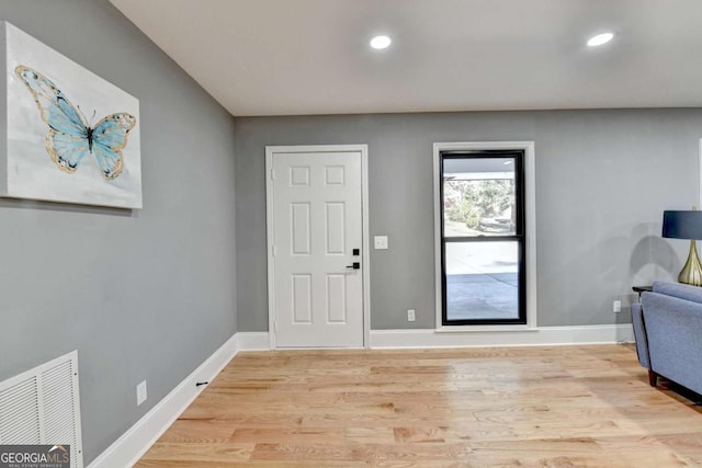 entryway with light hardwood / wood-style flooring