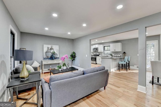 living room with light wood-type flooring