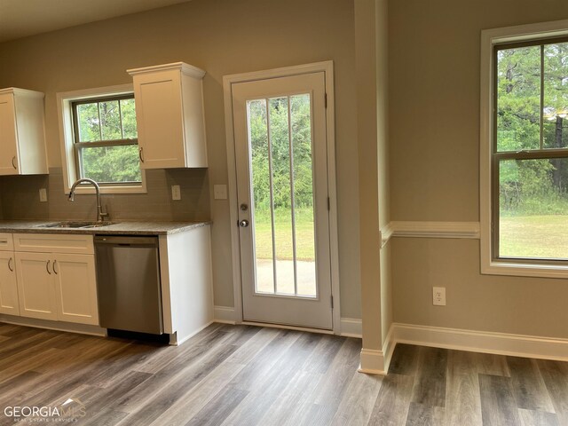 doorway with wood-type flooring and sink