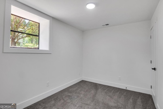 view of carpeted spare room