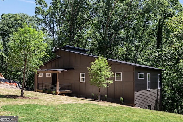 view of property exterior featuring a yard