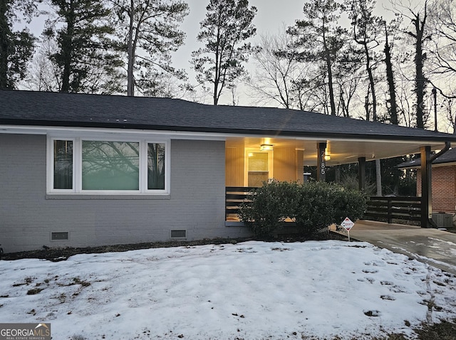 view of front of home featuring cooling unit