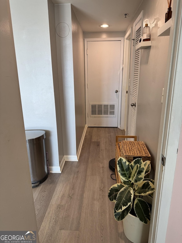 hall featuring hardwood / wood-style floors