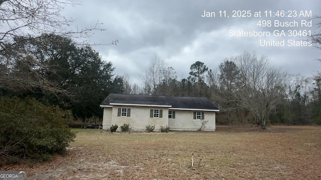 exterior space with a front yard