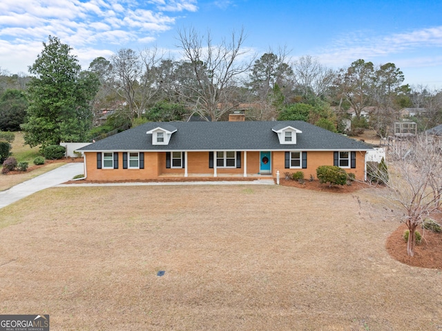 single story home featuring covered porch