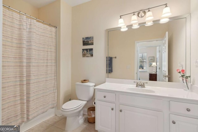 full bathroom with tile patterned floors, vanity, toilet, and shower / bath combo