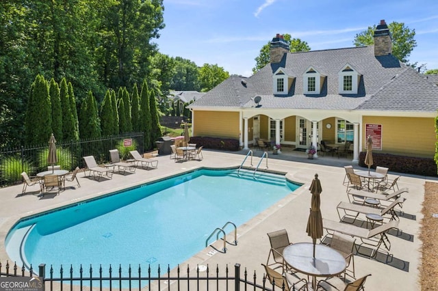 view of pool featuring a patio