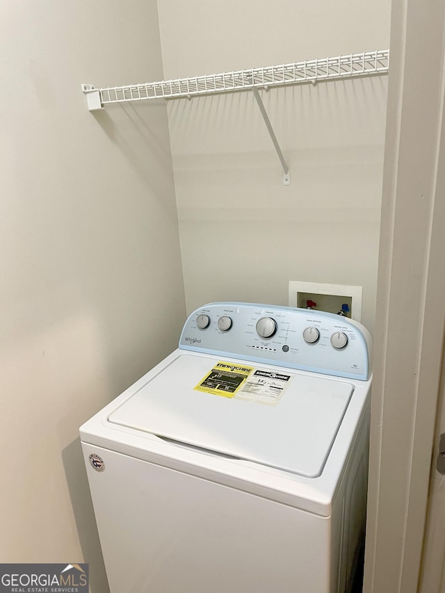 laundry room featuring washer / dryer