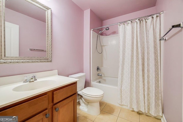 full bathroom featuring tile patterned floors, vanity, toilet, and shower / bath combo