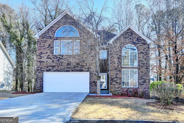 front of property with a garage