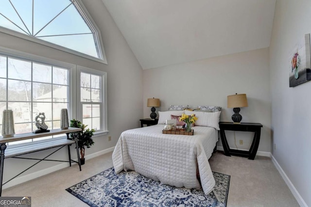 carpeted bedroom featuring high vaulted ceiling