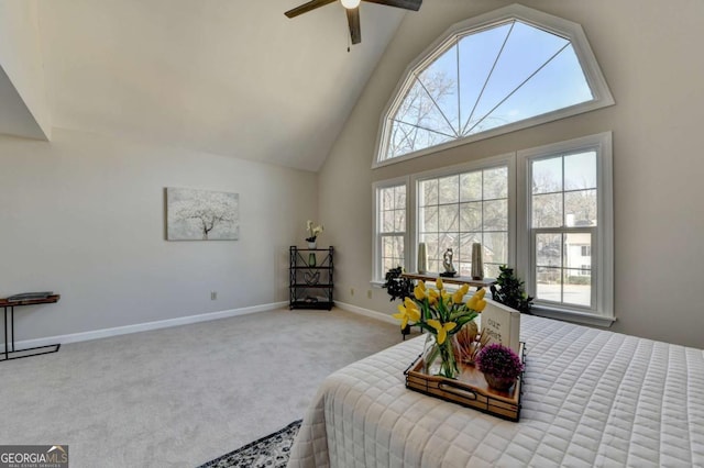 bedroom with high vaulted ceiling, carpet floors, and ceiling fan