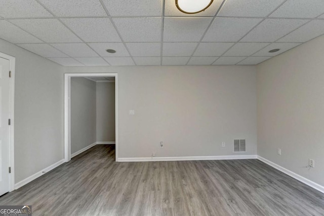 empty room with wood-type flooring