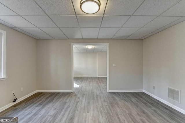 empty room with wood-type flooring