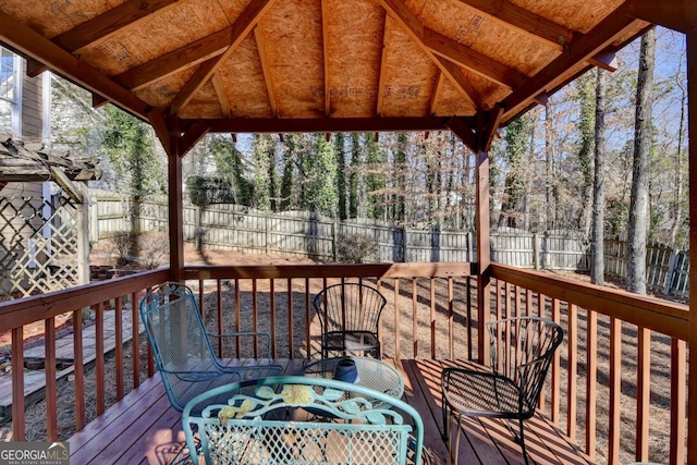 wooden deck featuring a gazebo