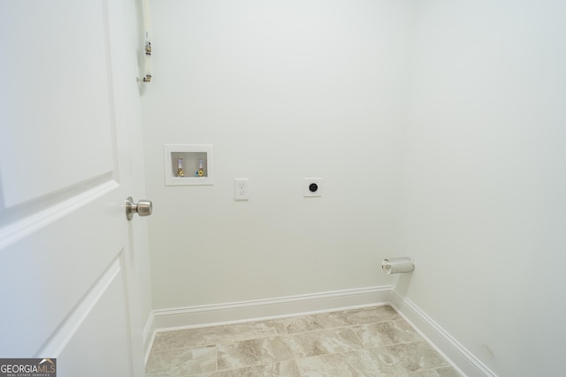 laundry room with hookup for a washing machine and hookup for an electric dryer