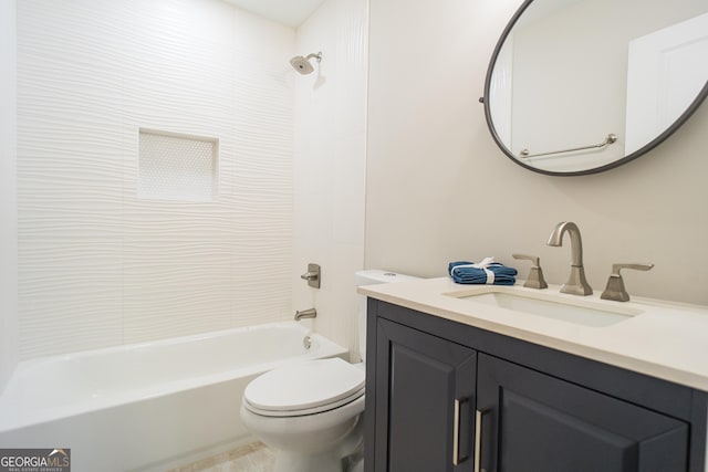 full bathroom with vanity, toilet, and tiled shower / bath combo