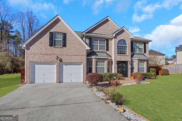 front of property with a garage and a front lawn