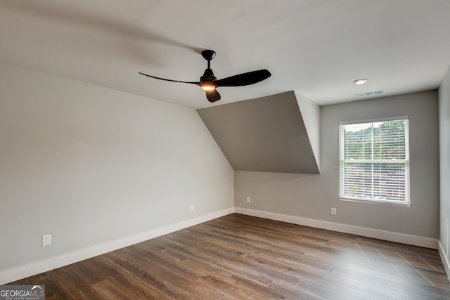 bonus room with lofted ceiling, wood-type flooring, and ceiling fan