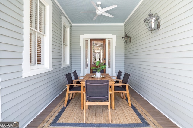 exterior space with ceiling fan