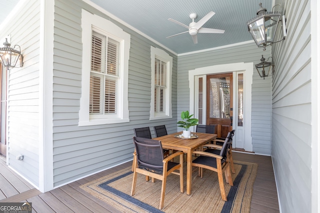 wooden deck with ceiling fan