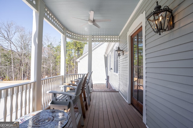 wooden deck with ceiling fan