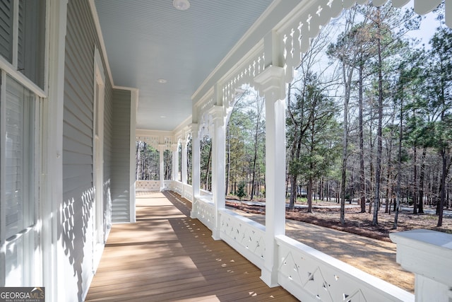 wooden deck featuring covered porch