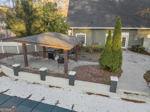 view of property's community featuring a gazebo and a patio area