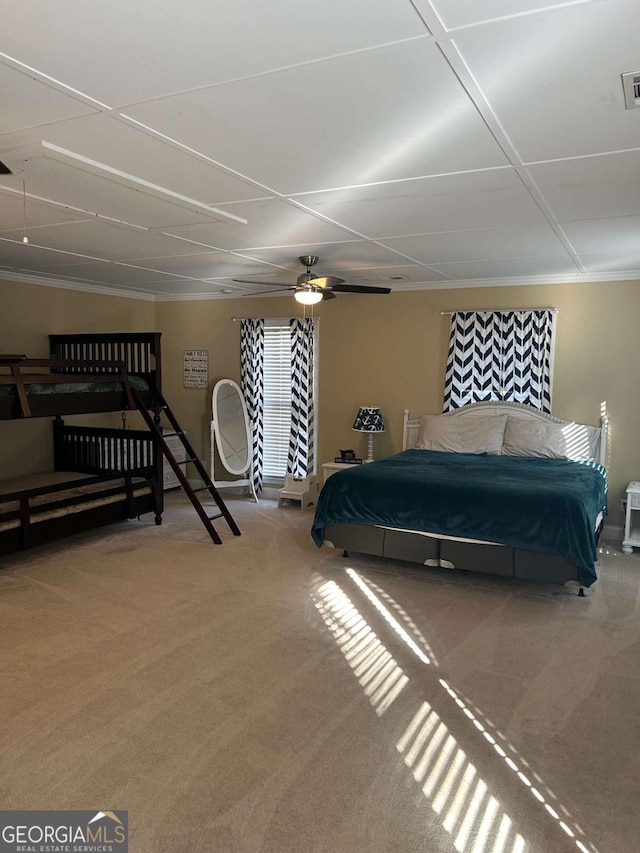 carpeted bedroom with ceiling fan