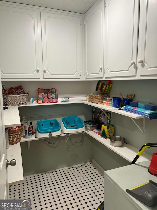 washroom featuring light tile patterned floors